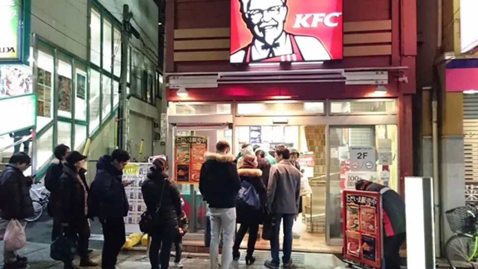 Families dig into KFC for Christmas in Japan